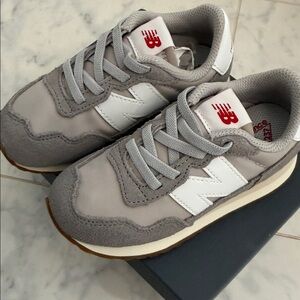 New Balance Kids Sneakers in Gray and White